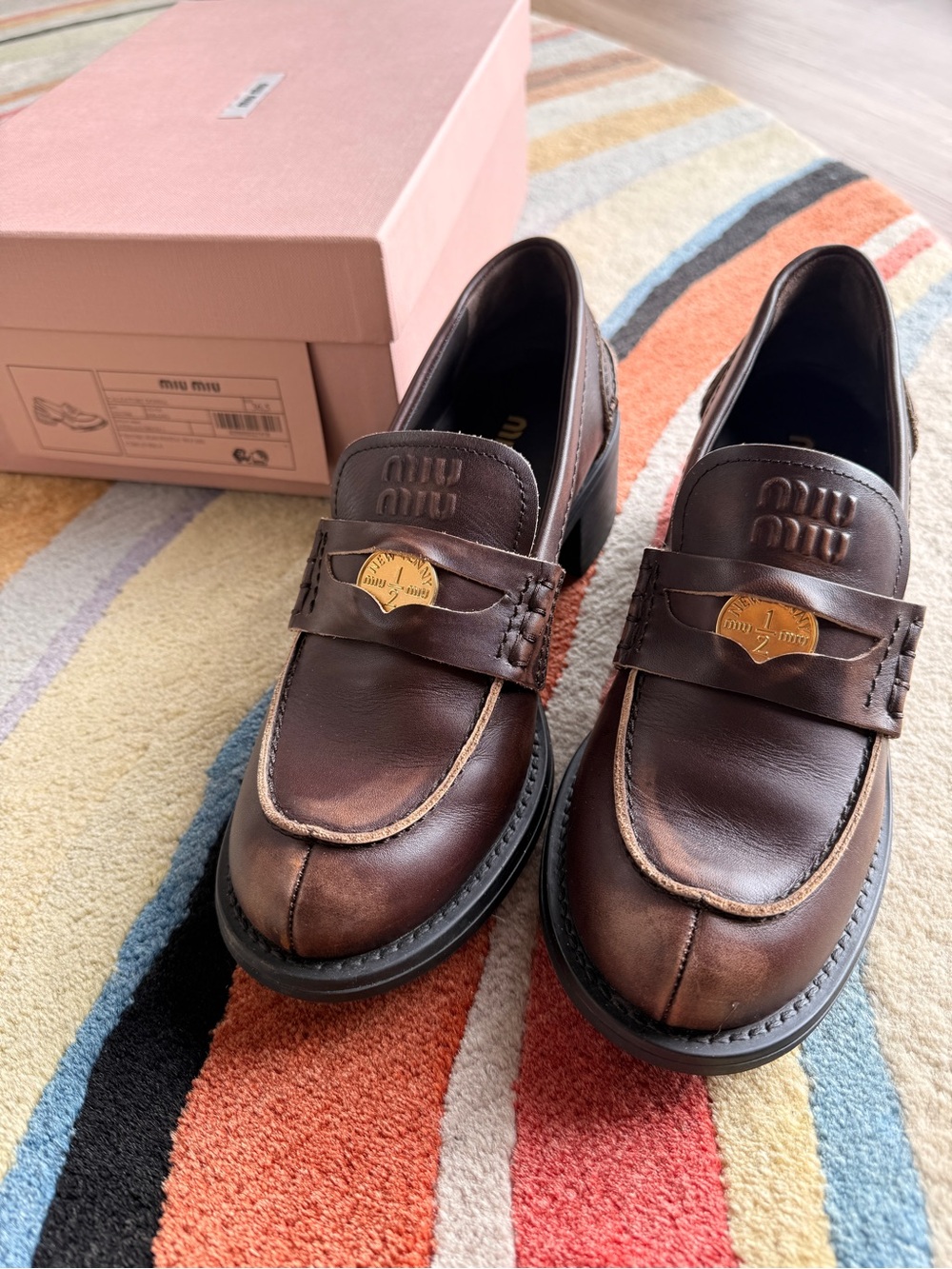 Miu Miu Women’s Deco calf leather Loafers